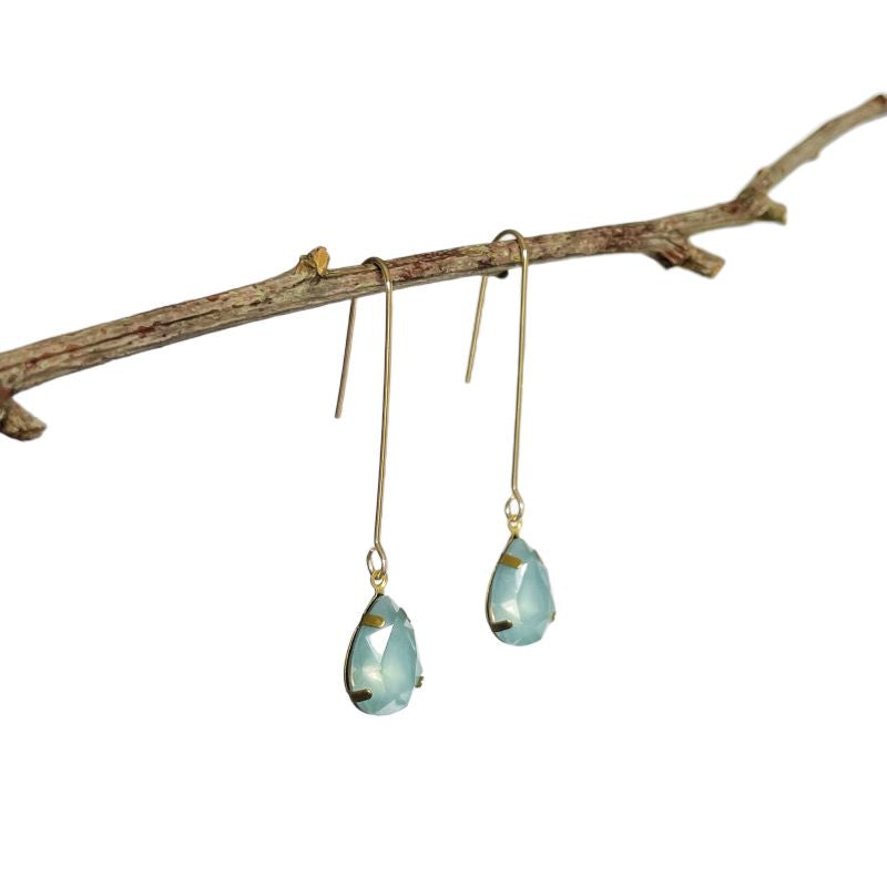 Earrings. Long Drop Ear Hook, Bronze Fixings. Soft Blue Teardrop Style Stone.